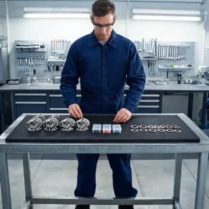 Parts coordinator arranging pump components